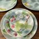 Service 10 plates and 14 sub-plates St Clement