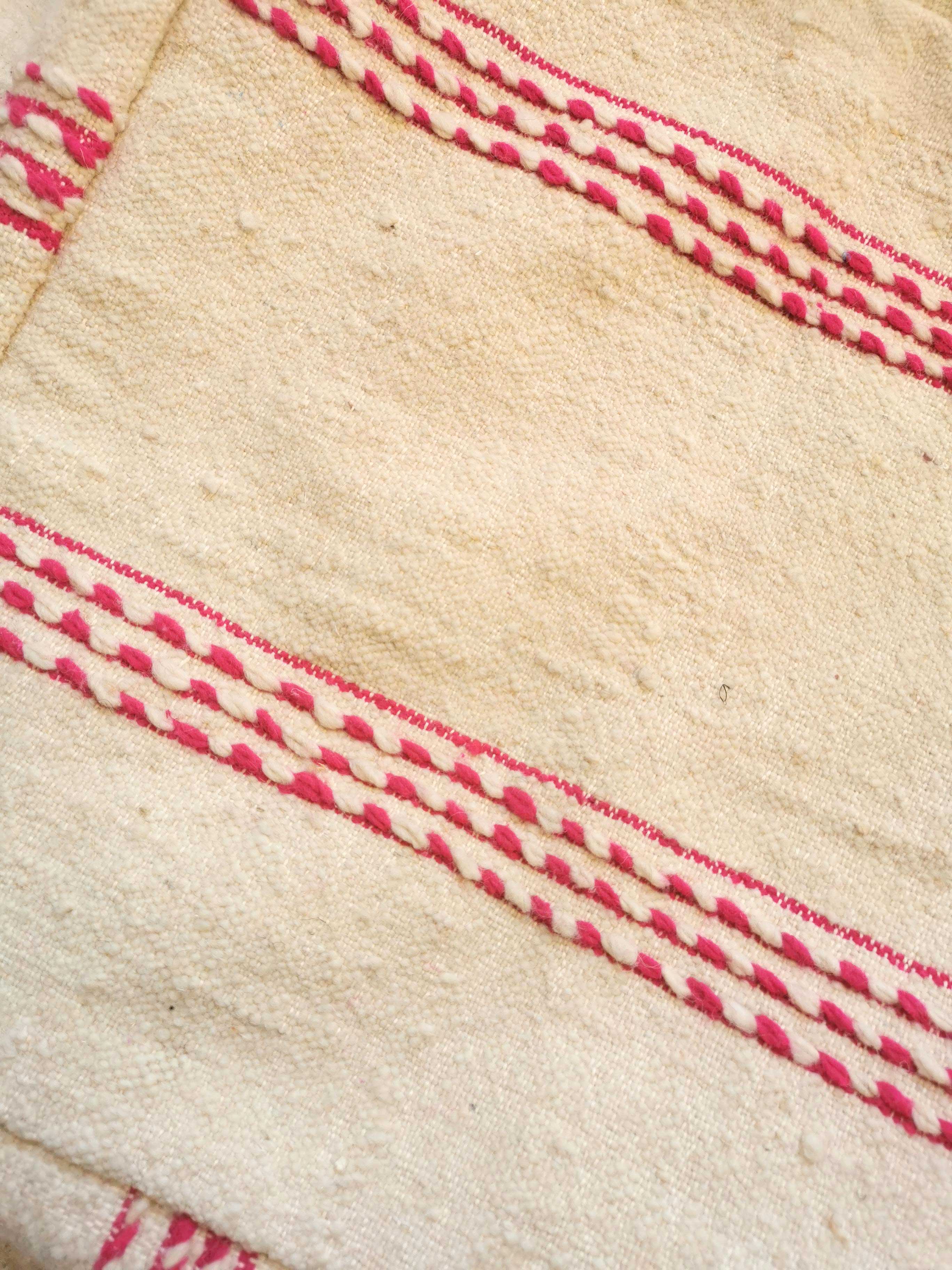 Berber kilim ottoman cover with fuchsia pink stripes