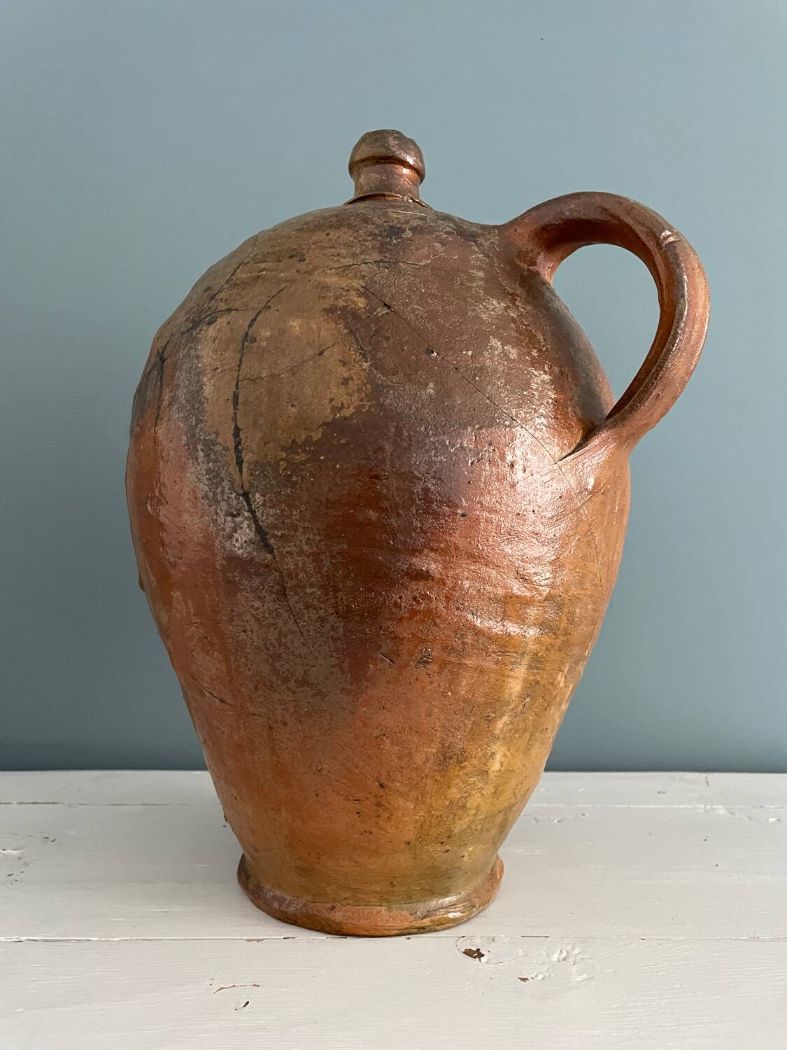 Large 19th century oil bottle in glazed earthenware