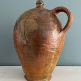Large 19th century oil bottle in glazed earthenware