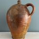 Large 19th century oil bottle in glazed earthenware