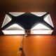 Wall lamp "Oyster" by Dietter Witte for Staff Leuchten. 1968