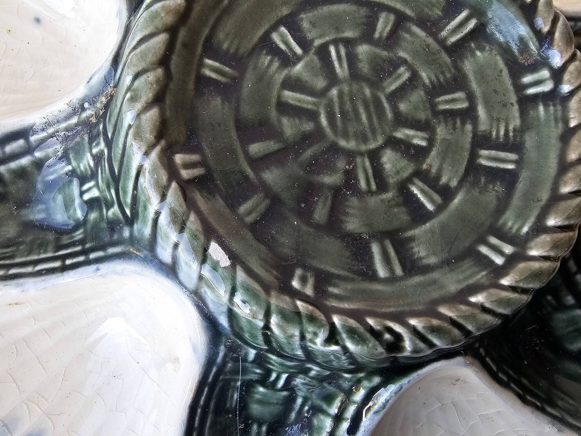 Set of 4 vintage green and white majolica oyster plates.