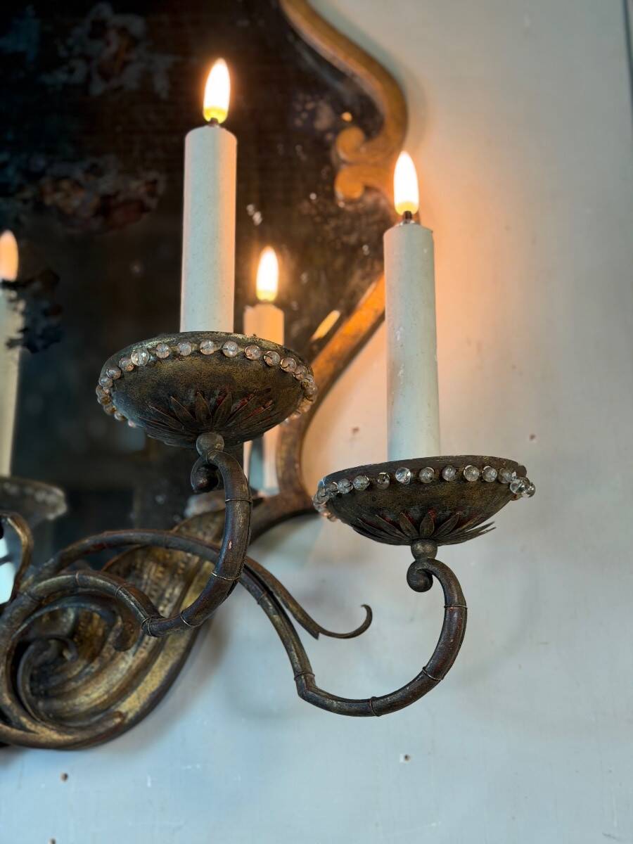 Gold metal wall mirror, in the style of Maison Baguès, Paris circa 1950.