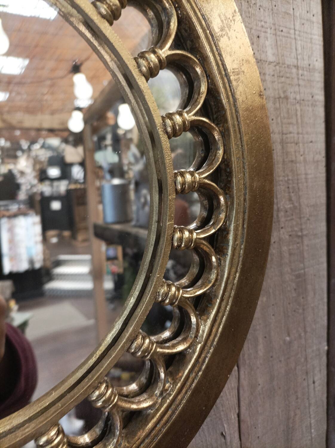 Round golden mirror