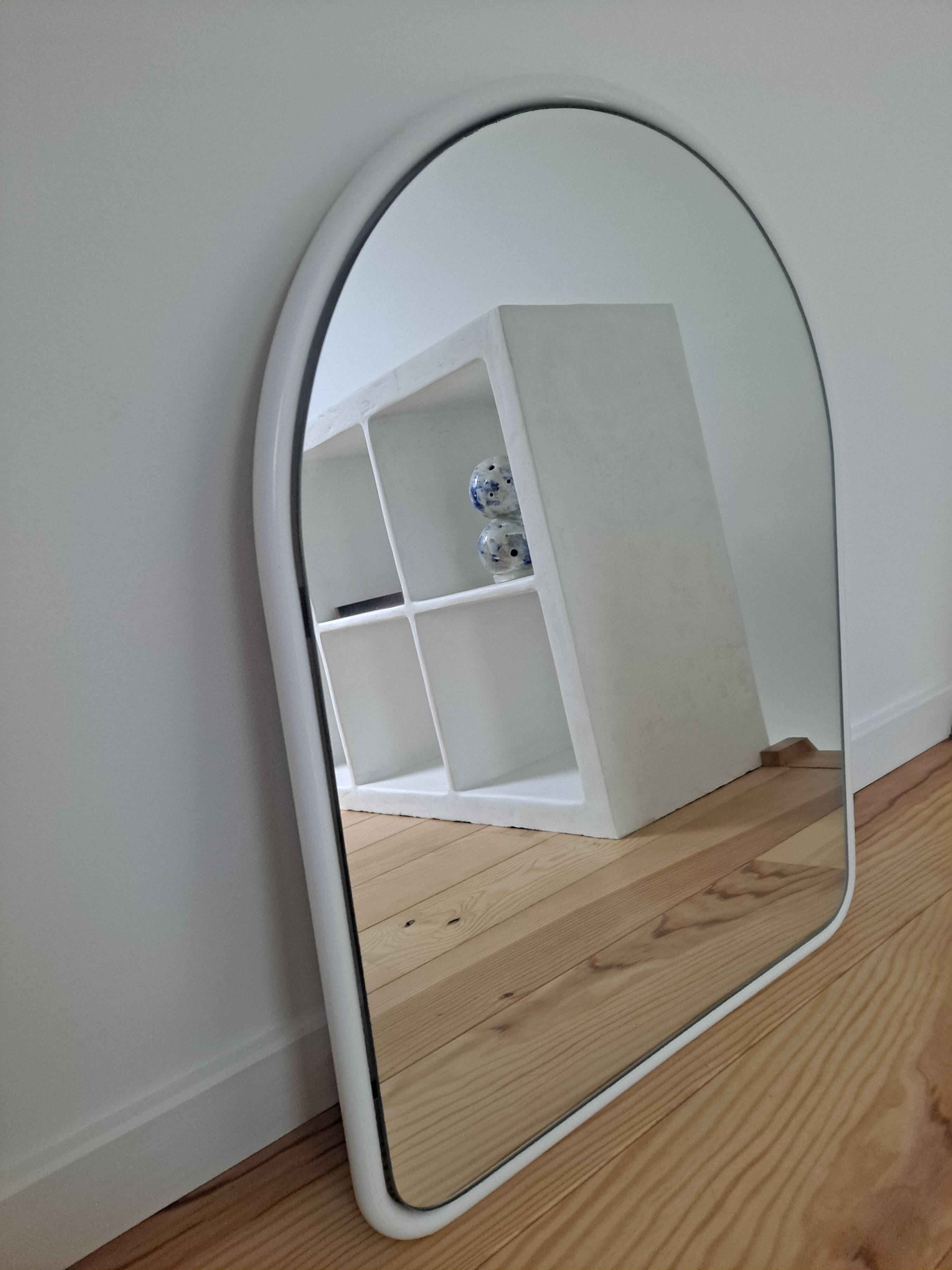 Arch mirror in white tubular steel frame from the 80s