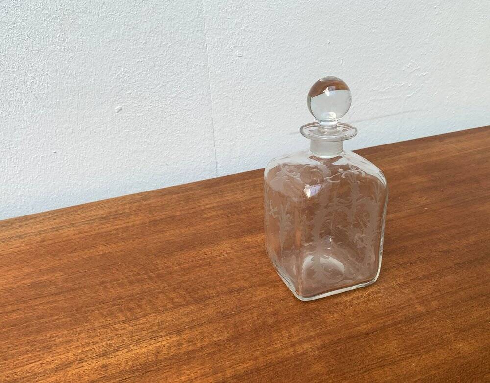 Vintage Danish glass bottle with engraving.