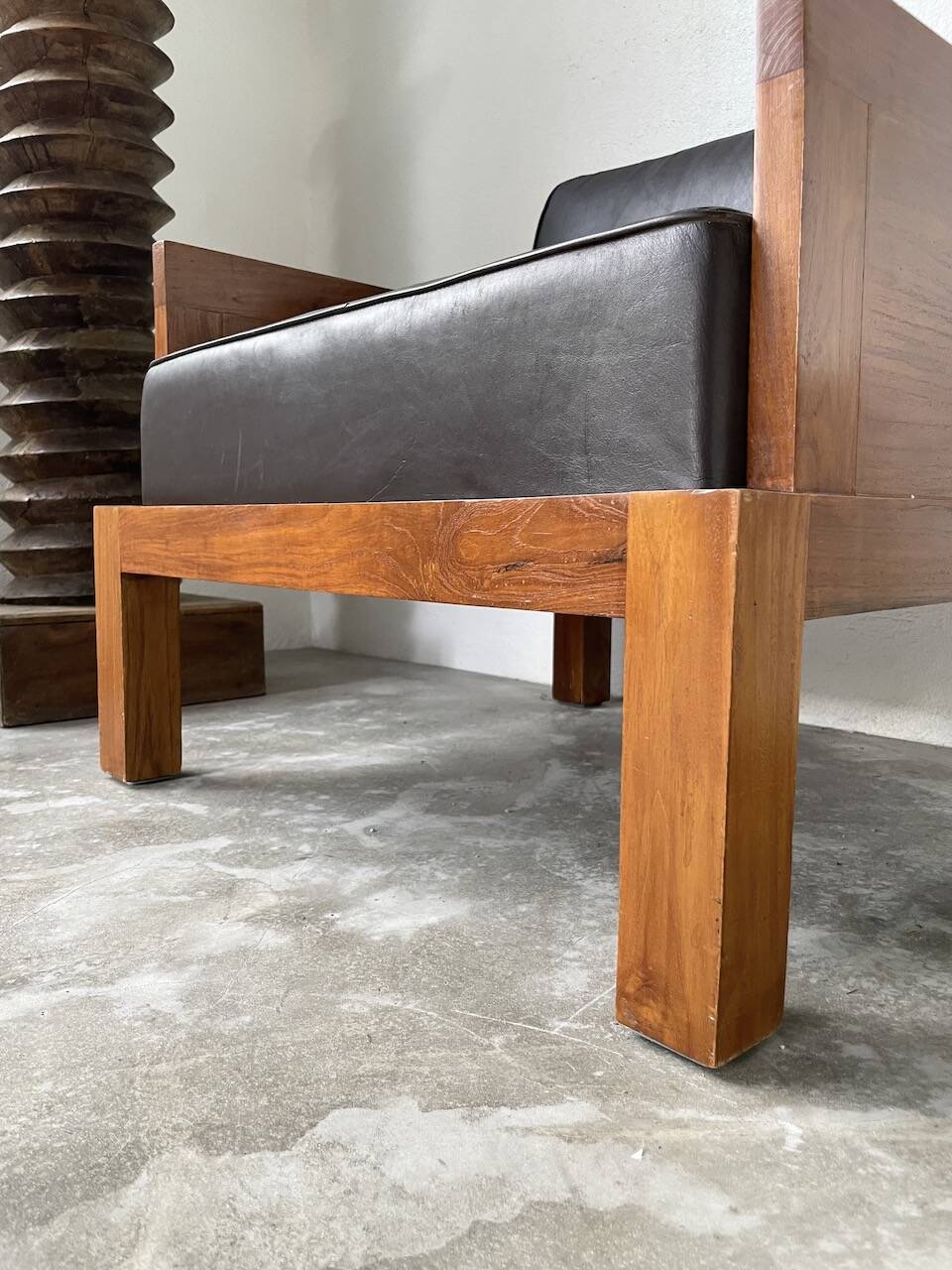 Modernist armchair in exotic wood and leather