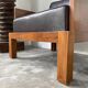 Modernist armchair in exotic wood and leather
