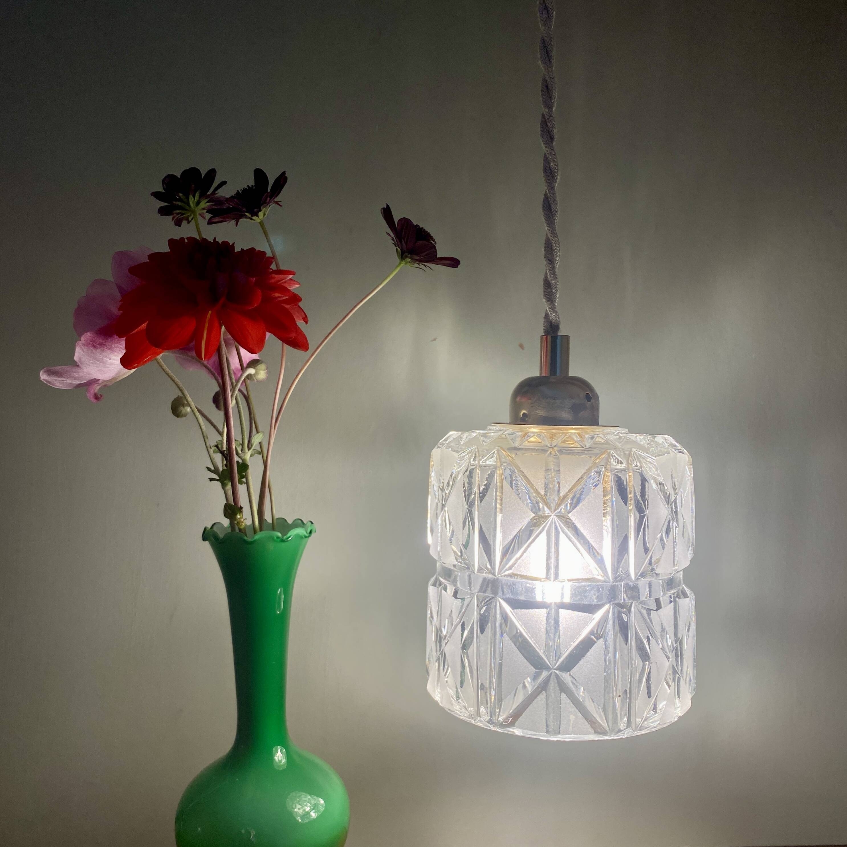 Vintage globe pendant light in thick, chiseled and frosted glass