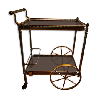 Golden metal serving trolley