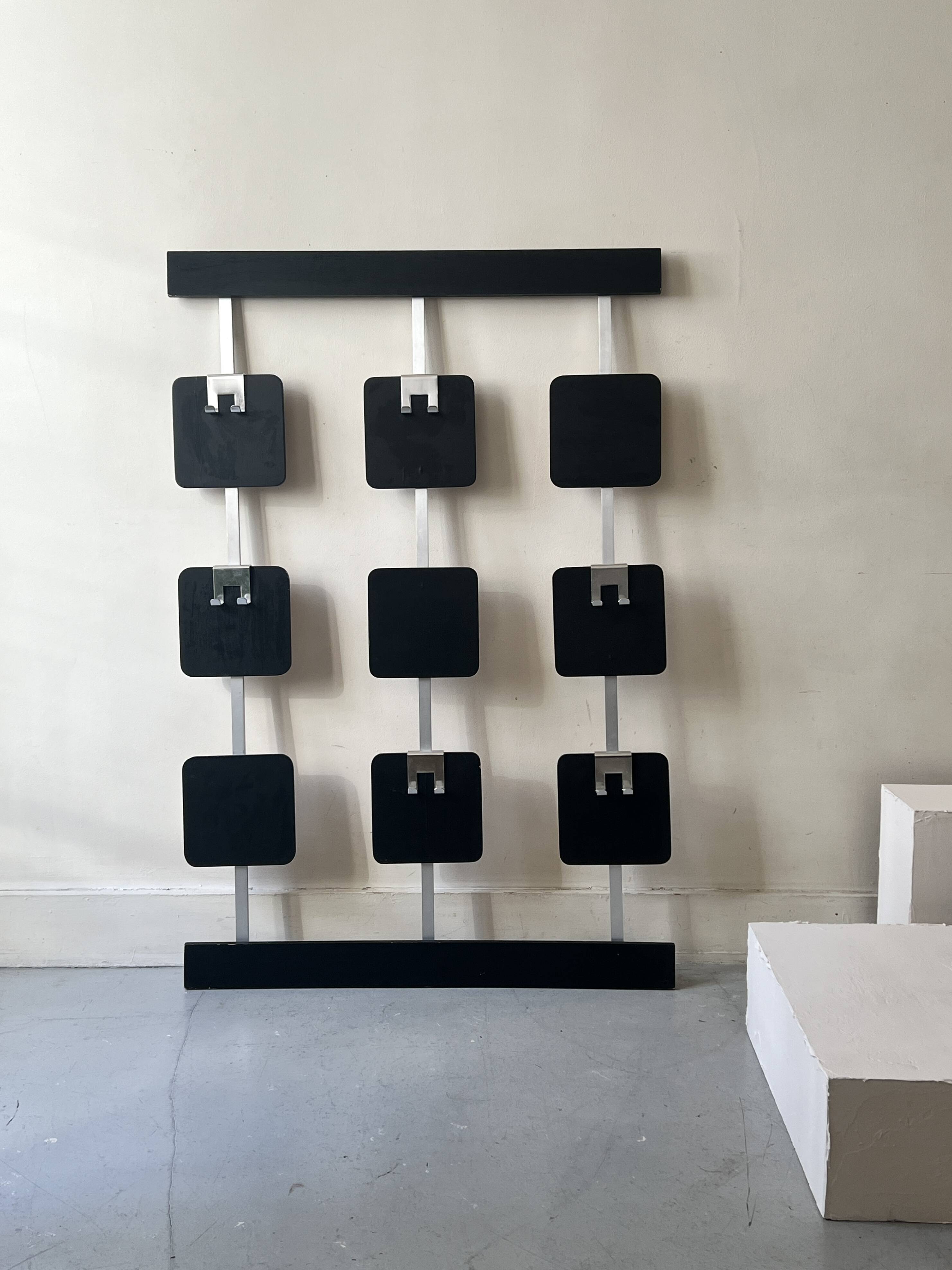 Large modernist wall coat rack in wood and metal, 1970s design.