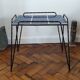 Vintage side table in twisted wrought iron and glazed ceramic.