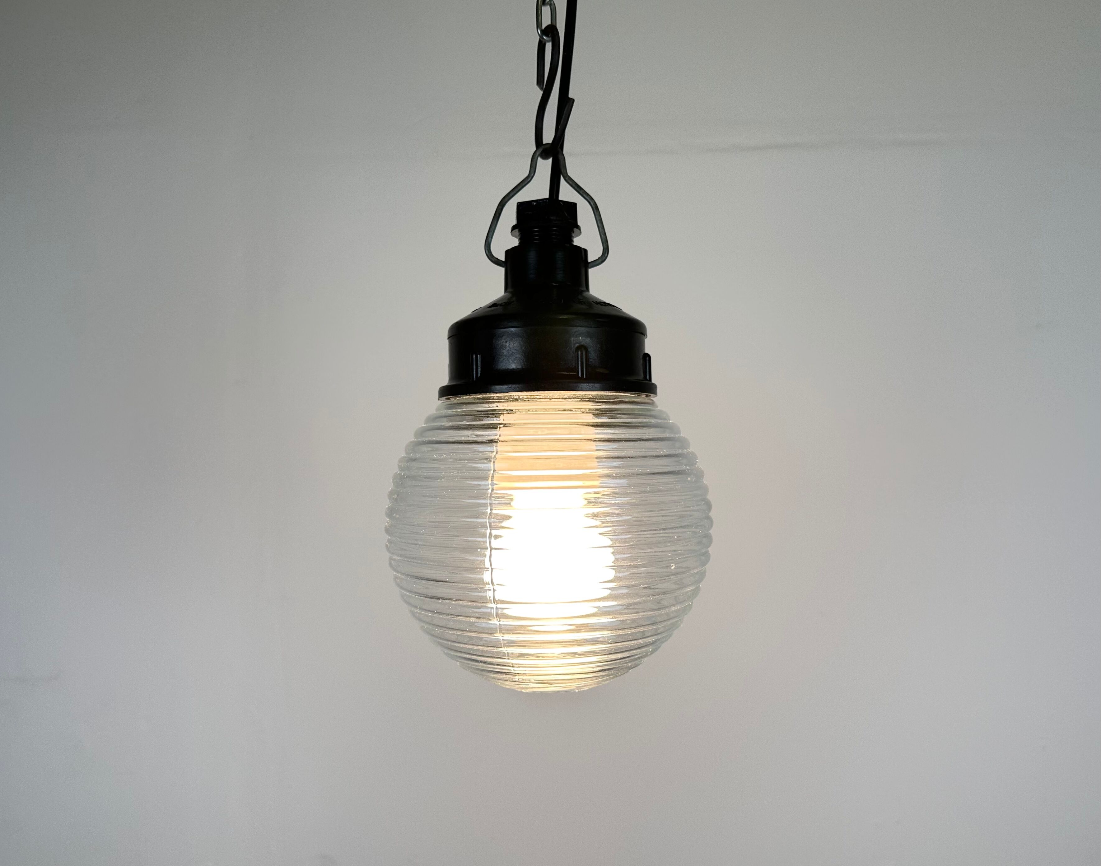 Industrial bakelite pendant light with ribbed glass, 1970s