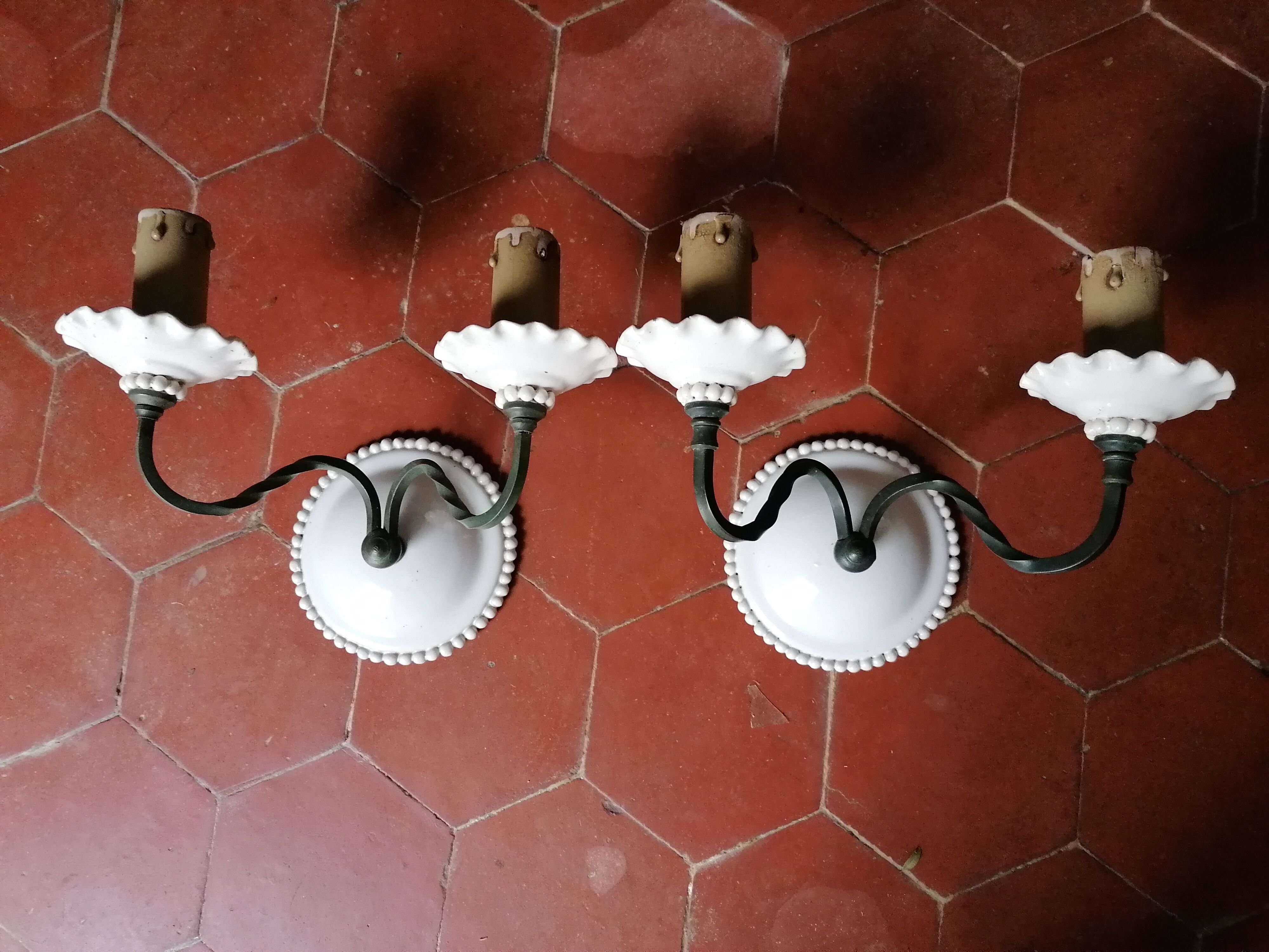 Pair of white faience wall lamps