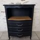 Chiffonnier en bois brut et peint en noir