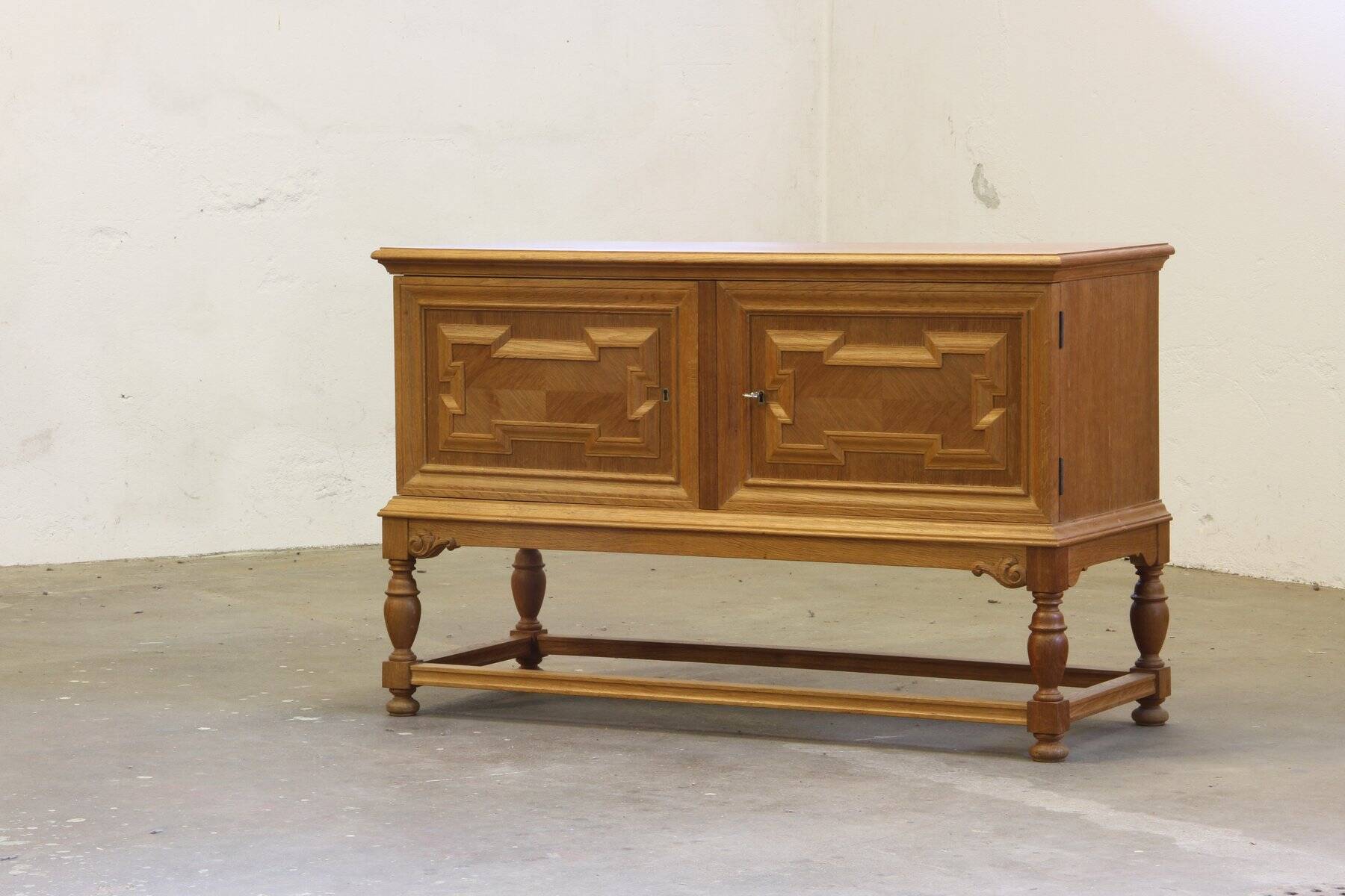 Vintage low sideboard in oak by Henning Kjærnulf, 1960s