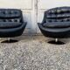 Pair of vintage swivel armchairs in black leather Tulip foot