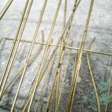 Guitar magazine rack in gold metal