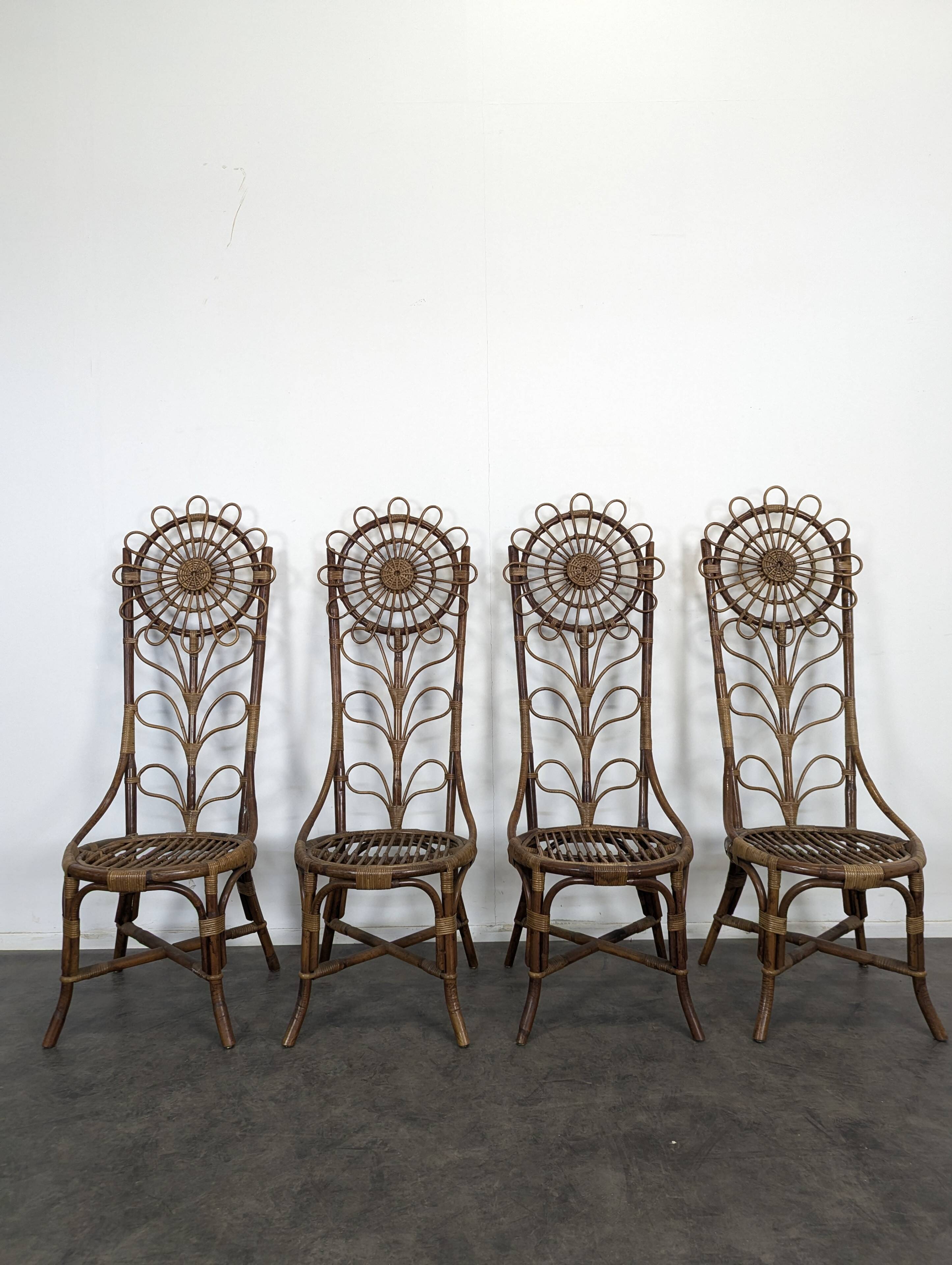 Set of 4 bamboo and rattan chairs with sunflower decoration.