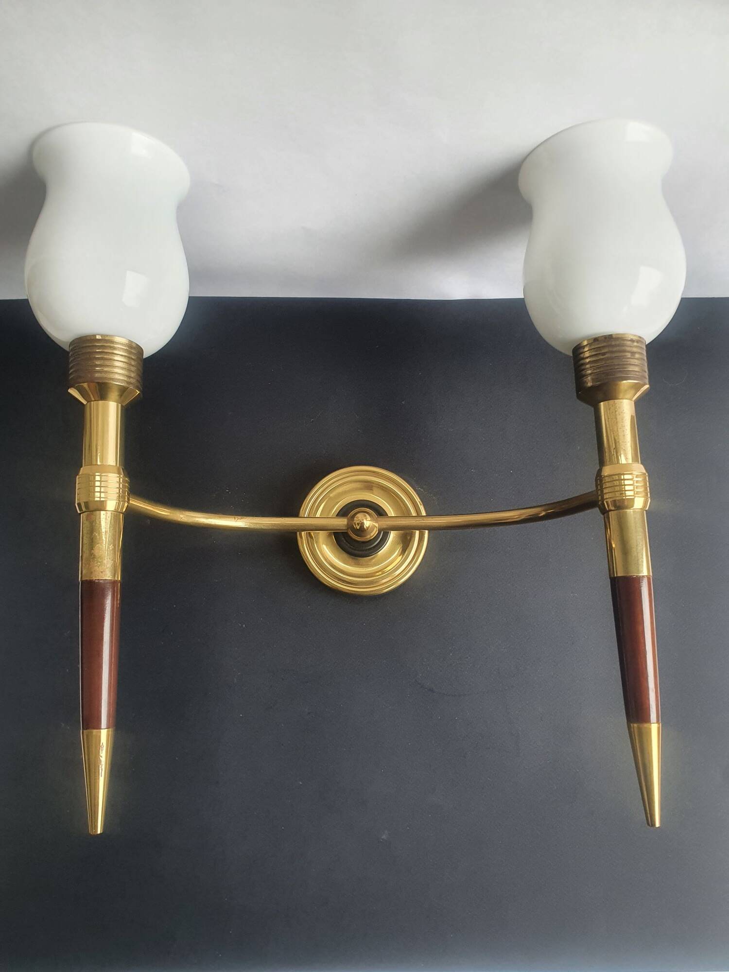 Pair of large torch-style wall sconces from the 1950s