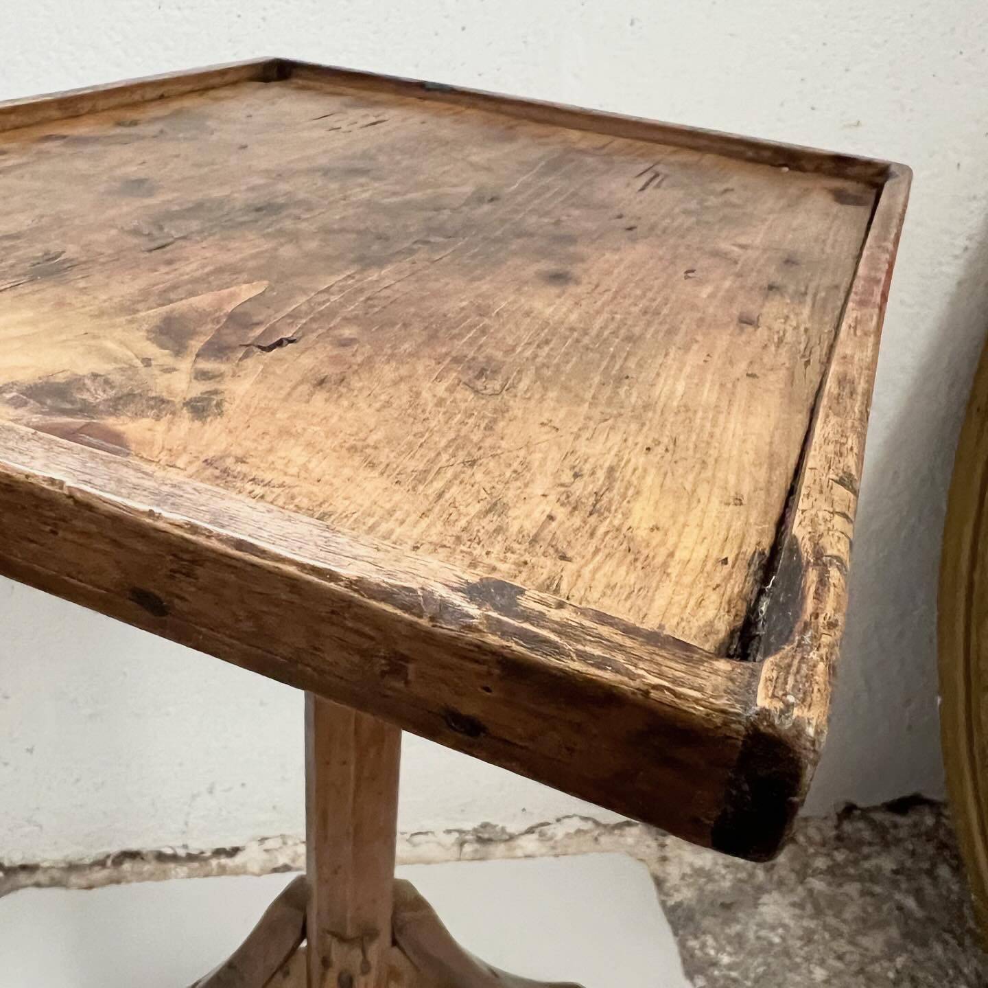 Old primitive wooden tripod pedestal table
