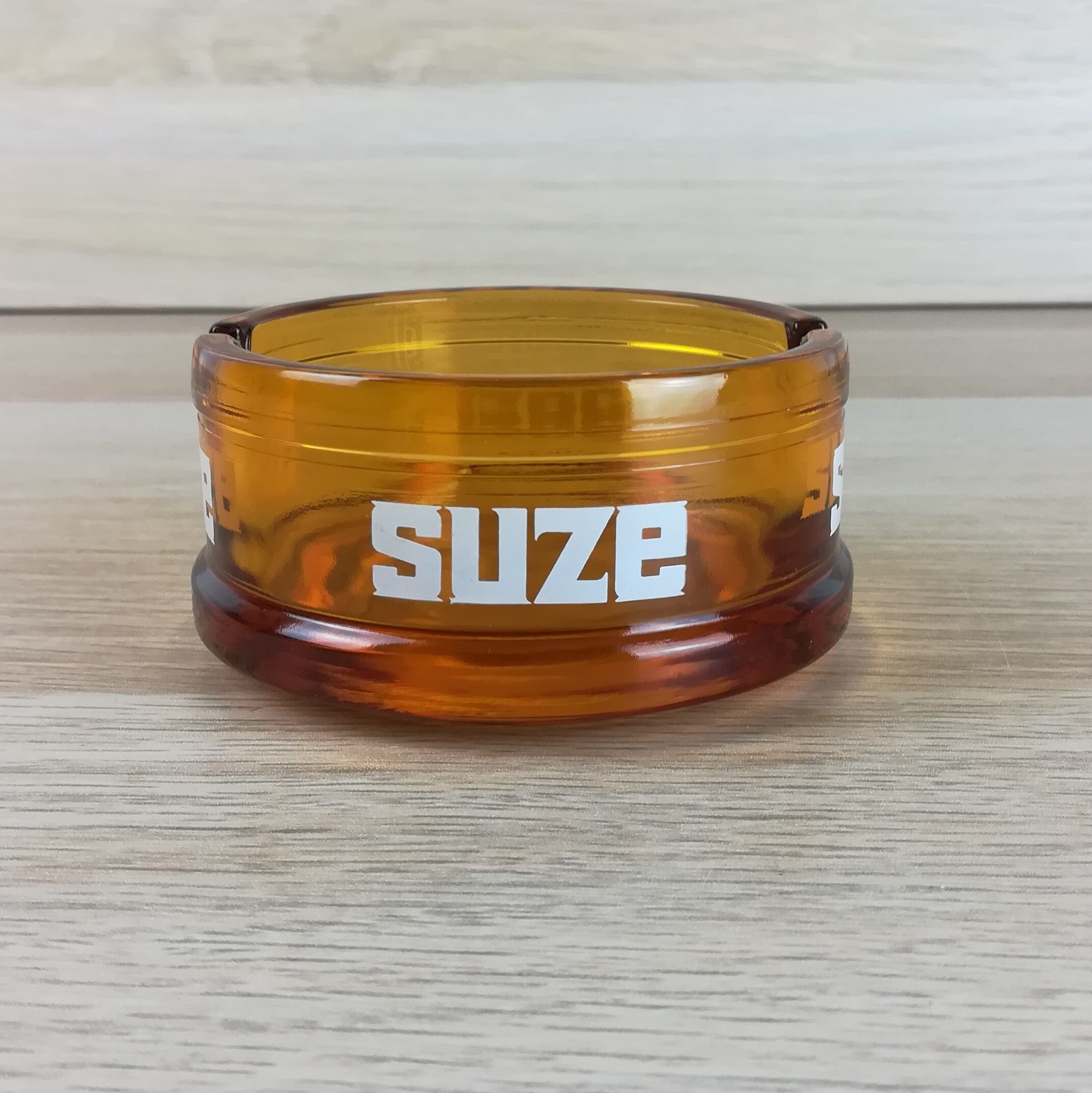 Advertising ashtray Suze