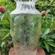 Old large molded glass vase with thistle decoration