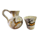 set of jug and ceramic cup handmade decorated with gazelle and deer