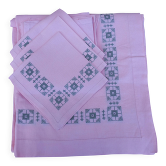 Large vintage linen tablecloth embroidered in pink and 12 matching napkins.