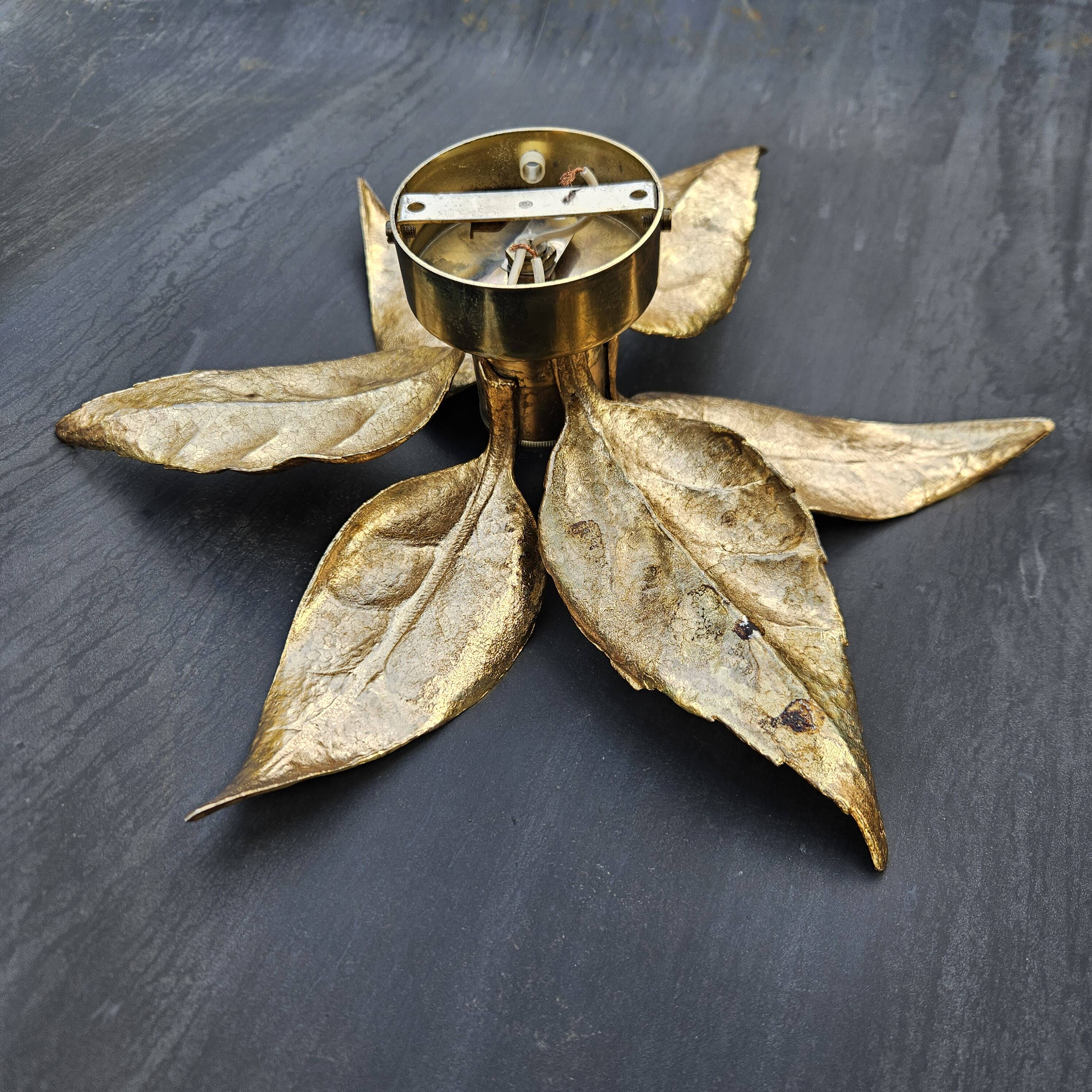 Pair of Massive wall lamps, designed by Willy Daro. 70s