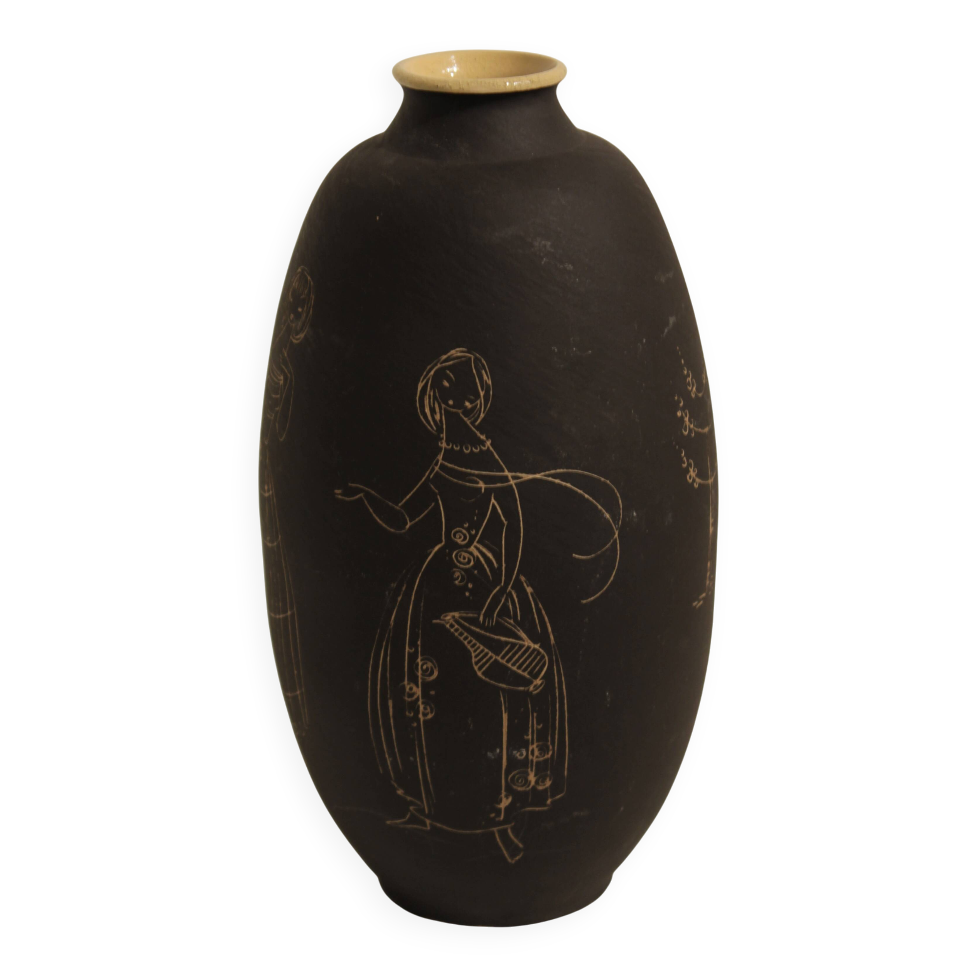 Ceramic vase decorated with women and a tree.