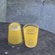 Liqueur service composed of a glass carafe and 8 small yellow screen-printed glasses