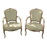 Pair of Rocaille style armchairs in green fabric and walnut, 19th century