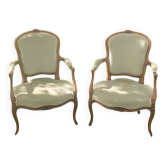 Pair of Rocaille style armchairs in green fabric and walnut, 19th century