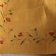 Yellow linen table centre
