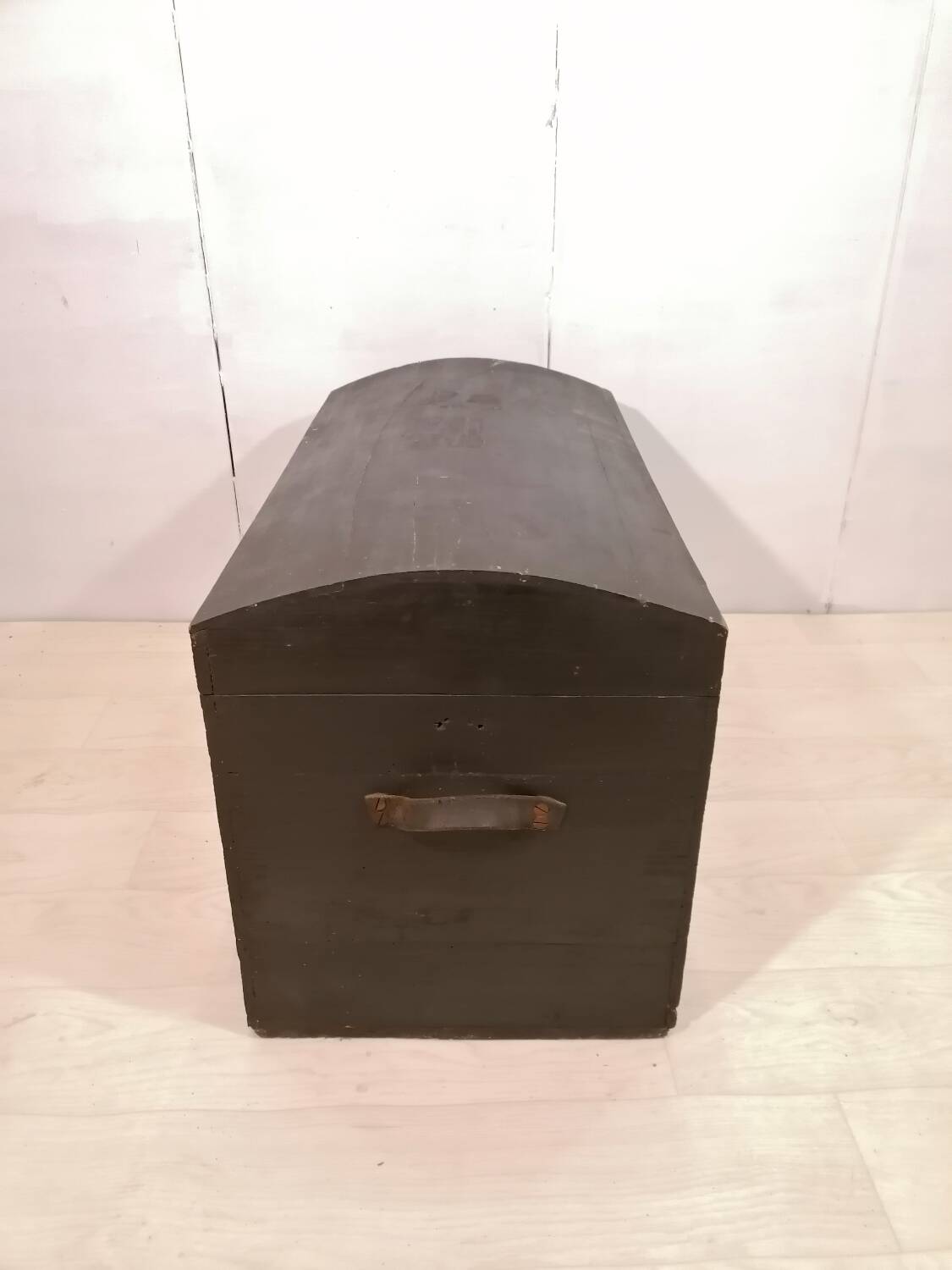Large travel trunk in blackened wood