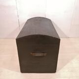 Large travel trunk in blackened wood