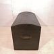 Large travel trunk in blackened wood
