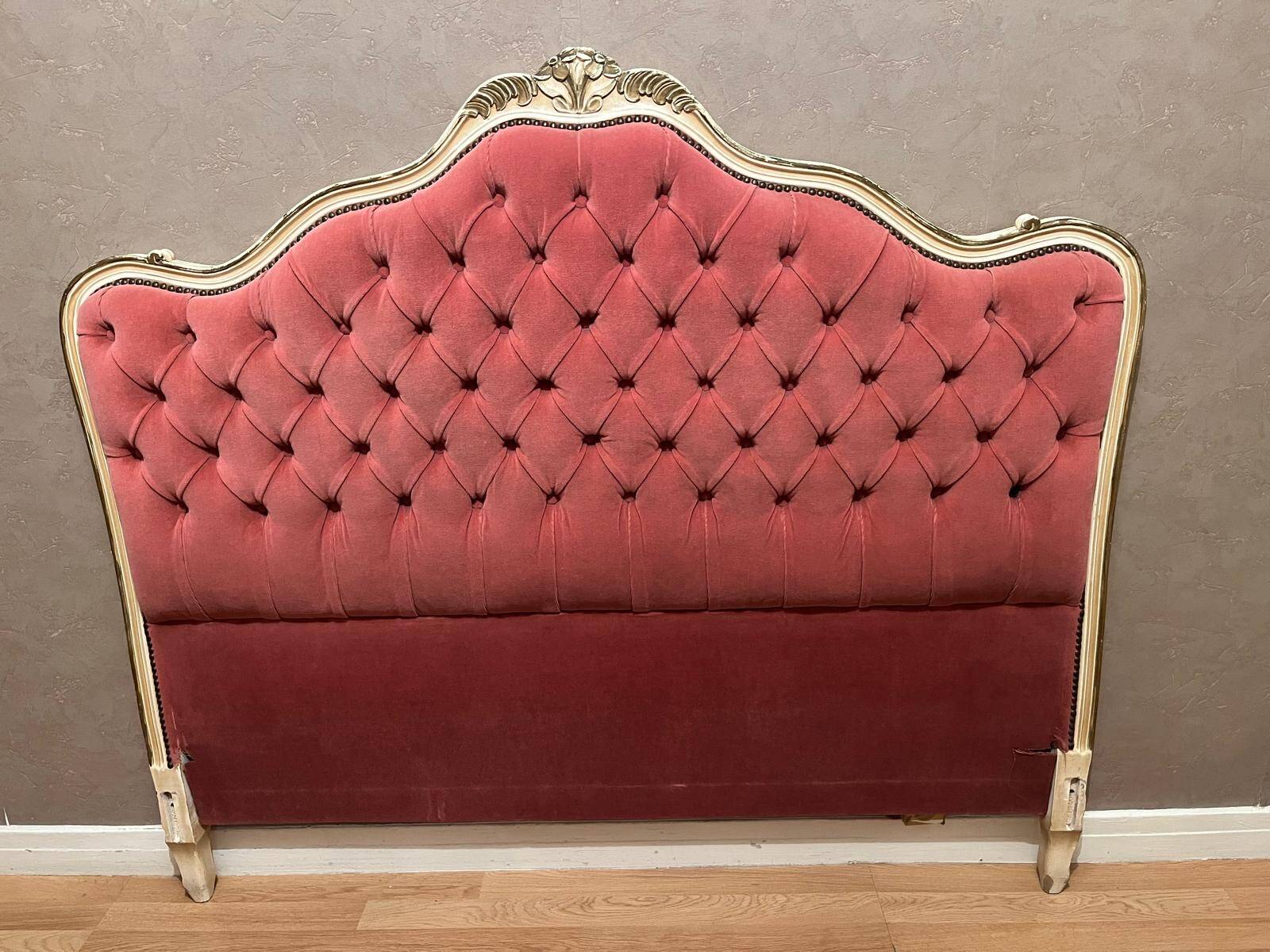 Upholstered bed in rosewood fabric