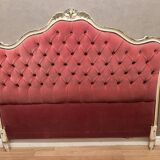 Upholstered bed in rosewood fabric