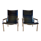 Set of 2 black leather and chrome reclining chairs designed by Hans Eichenberger.