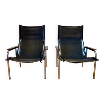 Set of 2 black leather and chrome reclining chairs, design "Hans Eichenberger".