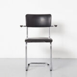 Tubax cantilever chair with black armrest