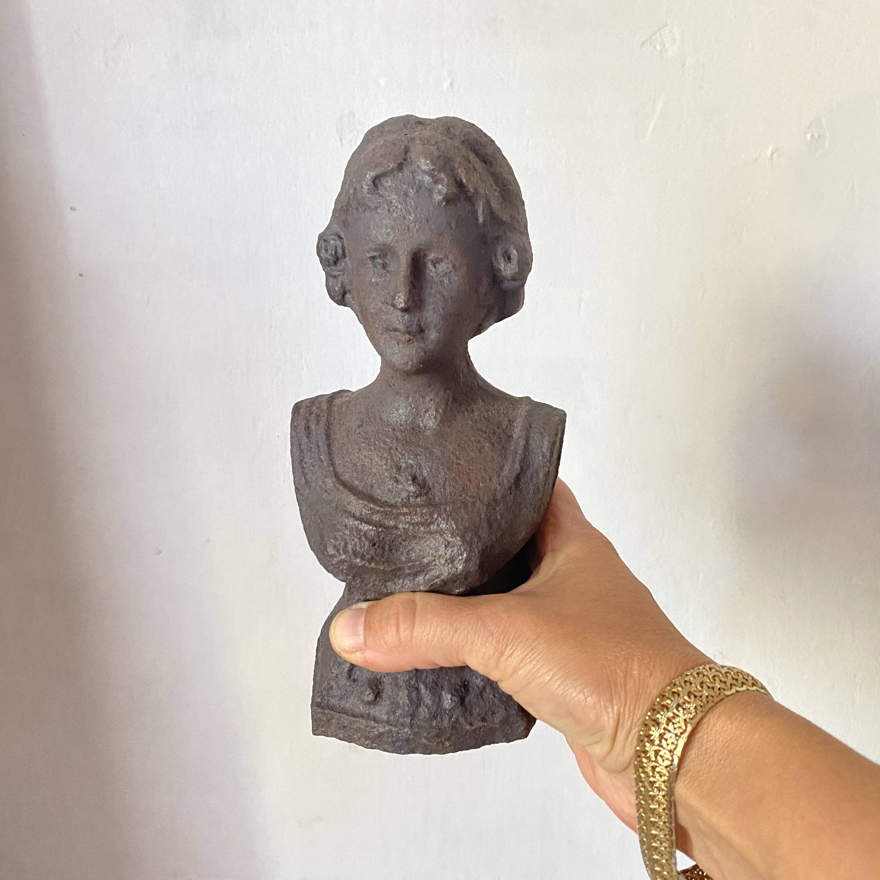 Cast iron bust door stop or bookend
