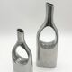 Pair of "drop" vases in aluminium cast, Italy, 1970s