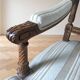 Louis XV style classic canapé reupholstered in striped beige fabric.