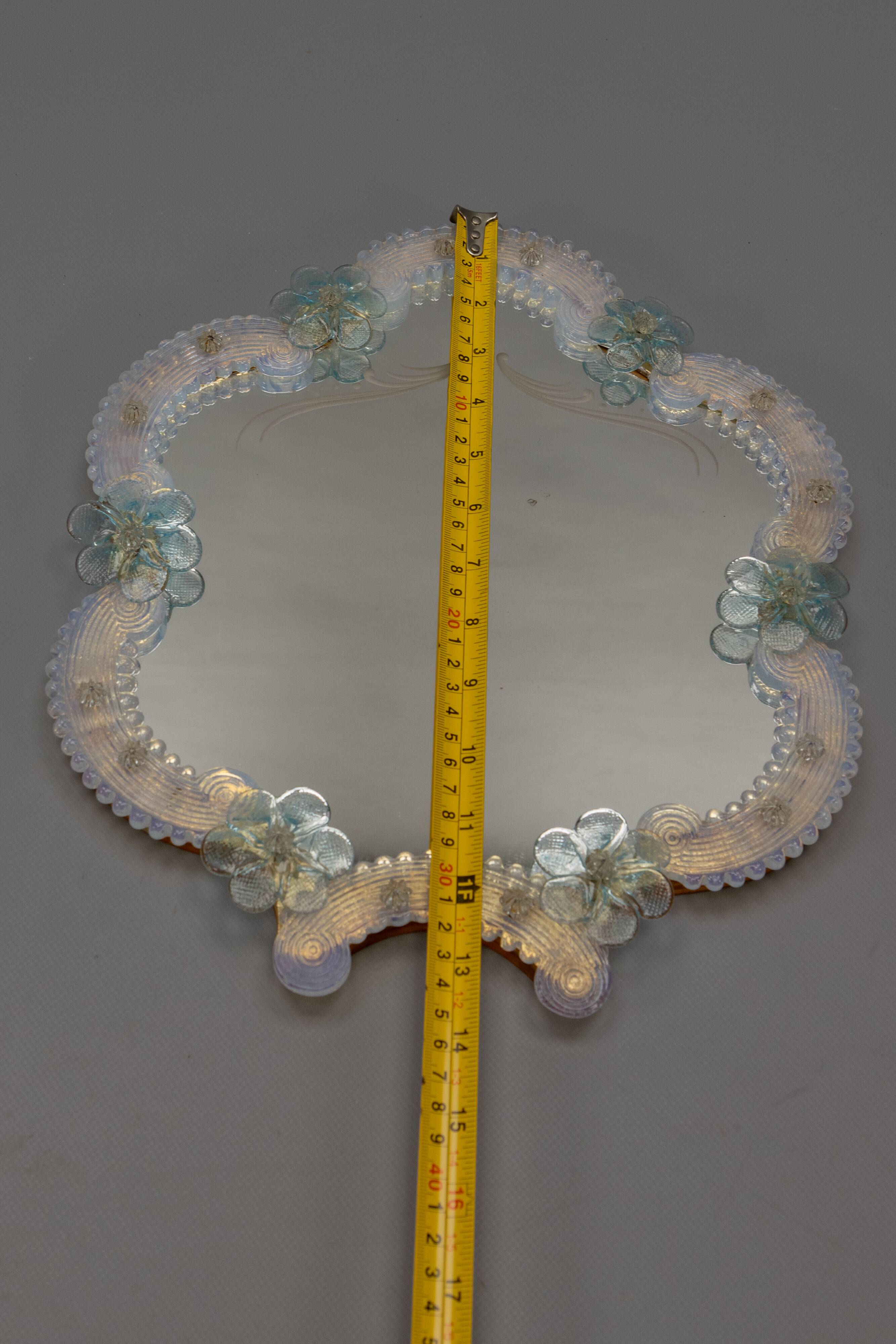 Italian Venetian Murano light blue and opalescent glass wall mirror, 1950s