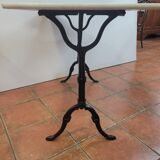 Table de bistrot piètement fonte dessus marbre