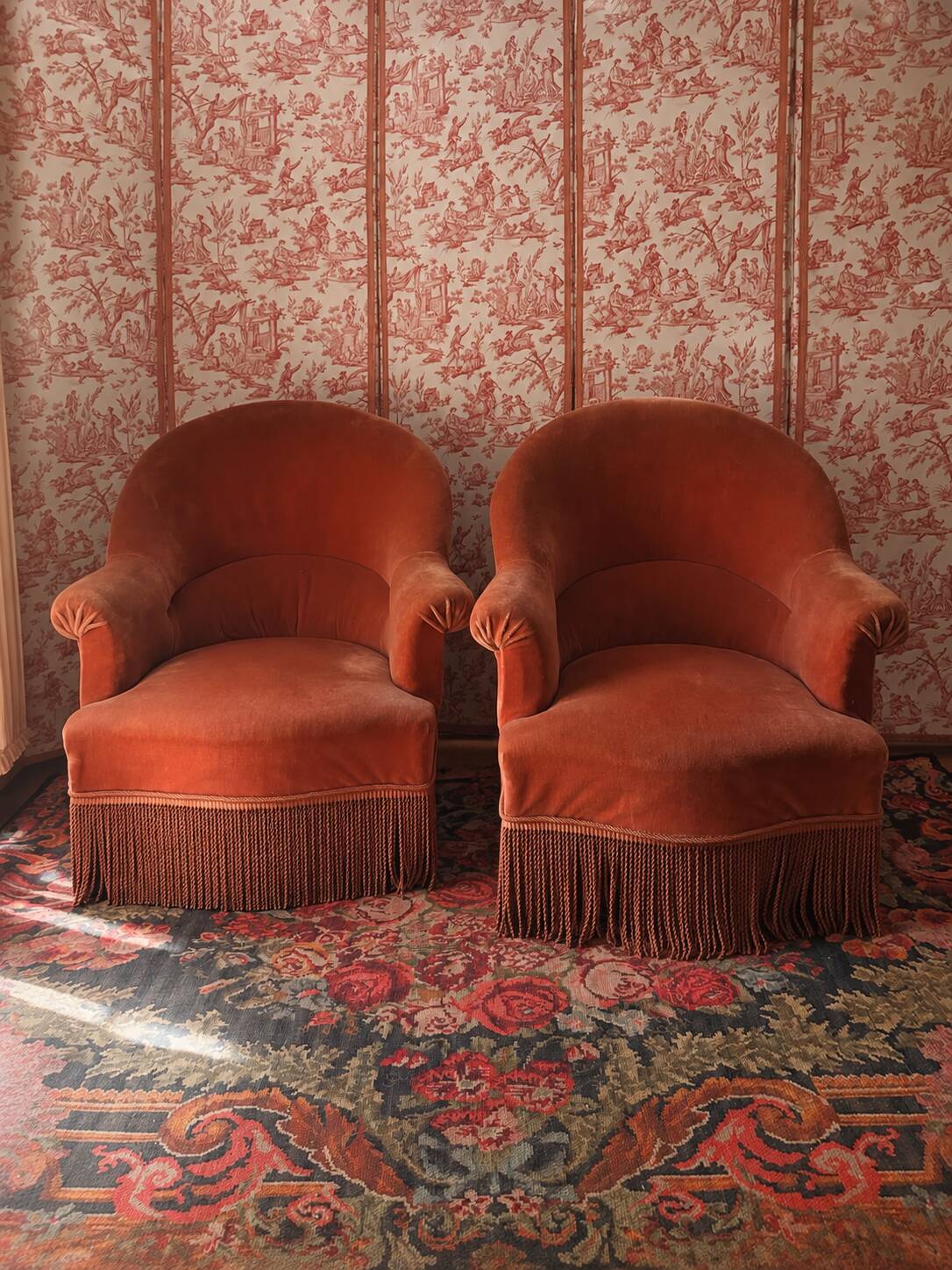 Pair of pink velvet tub chairs